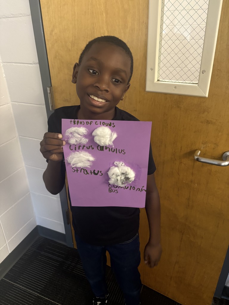 4th graders learning about clouds