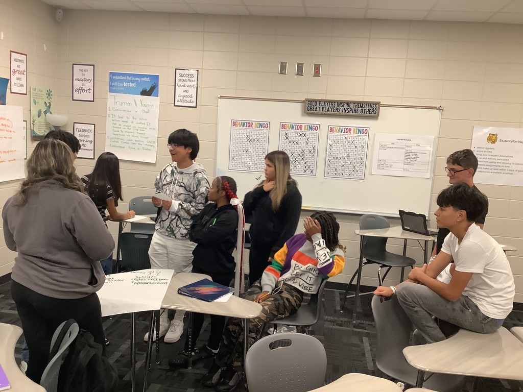 Image showing 📚✨ Coach Lanier’s Government classes have been diving deep into the Executive Branch and the roles of the President! 🇺🇸 As part of their unit on foreign policy, students became leaders of fictional countries 🌍—representing economic aid, military aid, humanitarian aid, and technology. Each country first reflected on its own strengths 💪 and weaknesses 🤔, then worked with others to find ways to cooperate. The ultimate challenge? 🤝 To create a treaty that benefits all four nations—ensuring balance, fairness, and collaboration without one country dominating the rest. To prepare, students explored real-world examples like the Marshall Plan, 9/11 & NATO, and the Lend-Lease Act, connecting history to today’s global relationships. 🌐 We’re so proud of our Tigers for learning how cooperation and diplomacy shape the world! 🐅💛🖤 #ClaxtonTigers #GovernmentClass #ExecutiveBranch #FutureLeaders #ForeignPolicy #Teamwork #LearningByDoing #BlackAndGold