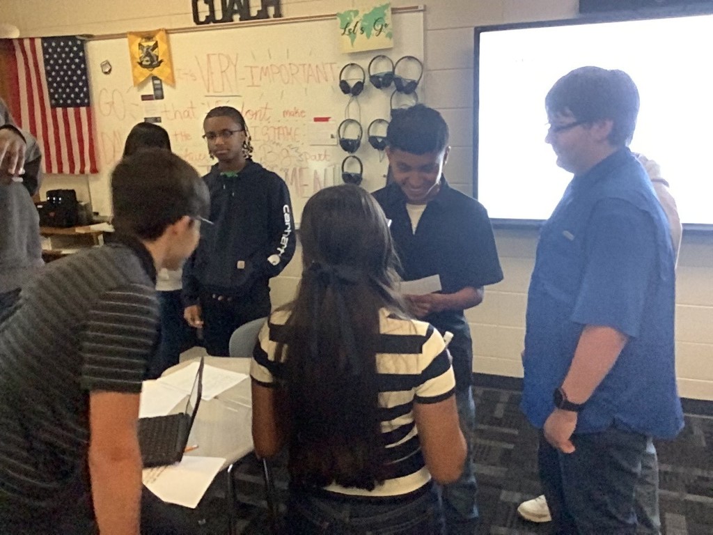 Image showing 📚✨ Coach Lanier’s Government classes have been diving deep into the Executive Branch and the roles of the President! 🇺🇸 As part of their unit on foreign policy, students became leaders of fictional countries 🌍—representing economic aid, military aid, humanitarian aid, and technology. Each country first reflected on its own strengths 💪 and weaknesses 🤔, then worked with others to find ways to cooperate. The ultimate challenge? 🤝 To create a treaty that benefits all four nations—ensuring balance, fairness, and collaboration without one country dominating the rest. To prepare, students explored real-world examples like the Marshall Plan, 9/11 & NATO, and the Lend-Lease Act, connecting history to today’s global relationships. 🌐 We’re so proud of our Tigers for learning how cooperation and diplomacy shape the world! 🐅💛🖤 #ClaxtonTigers #GovernmentClass #ExecutiveBranch #FutureLeaders #ForeignPolicy #Teamwork #LearningByDoing #BlackAndGold