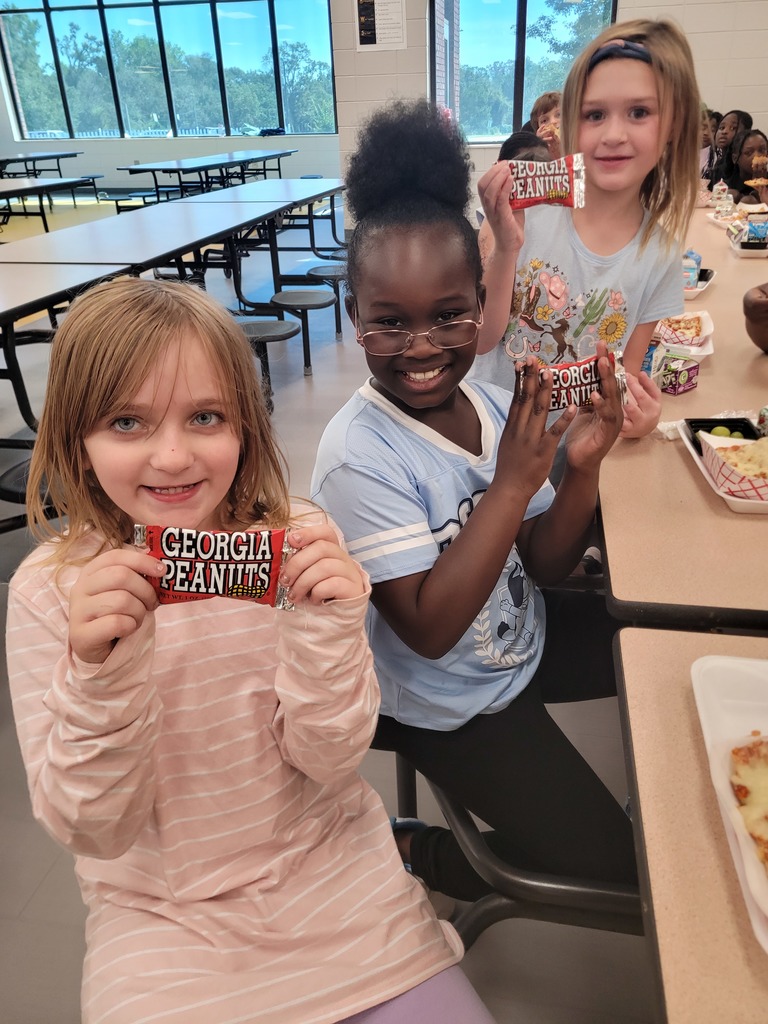 Students pictured with bags of Georgia Peanuts!