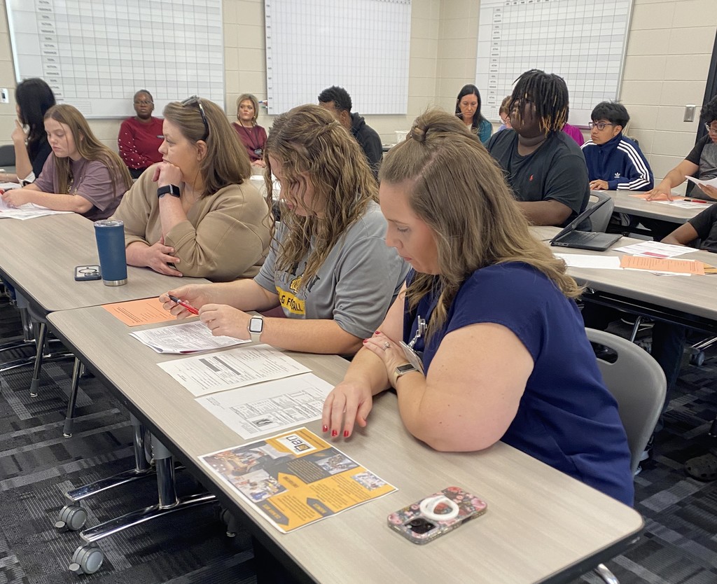 Parents and students attending advisement