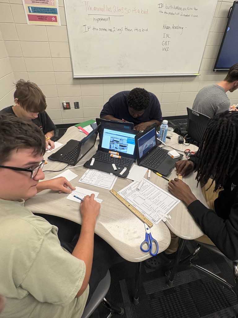 Image showing 📚🤖 In Mrs. Selph’s and Mrs. Cook’s College Readiness class, we’re taking on CRM.GSR.5.4 — using formulas to calculate the volume and surface area of 3D shapes like spheres, prisms, cylinders, pyramids, and cones. But we’re not just crunching numbers… ✏️➗ We’re building robots out of 3D shapes 🤖✨ and proving the math behind them through their surface area and volume! 🐅💛🖤 Go Claxton High School Tigers — black and gold pride all the way! 🖤💛🐅 #CHSTigers #BlackAndGold #CollegeReadiness #STEM #3DShapes #MathInAction #FutureReady