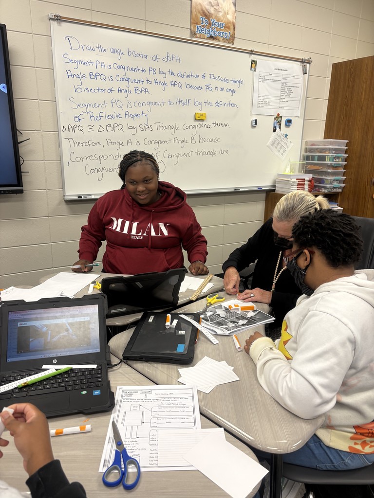 Image showing 📚🤖 In Mrs. Selph’s and Mrs. Cook’s College Readiness class, we’re taking on CRM.GSR.5.4 — using formulas to calculate the volume and surface area of 3D shapes like spheres, prisms, cylinders, pyramids, and cones. But we’re not just crunching numbers… ✏️➗ We’re building robots out of 3D shapes 🤖✨ and proving the math behind them through their surface area and volume! 🐅💛🖤 Go Claxton High School Tigers — black and gold pride all the way! 🖤💛🐅 #CHSTigers #BlackAndGold #CollegeReadiness #STEM #3DShapes #MathInAction #FutureReady