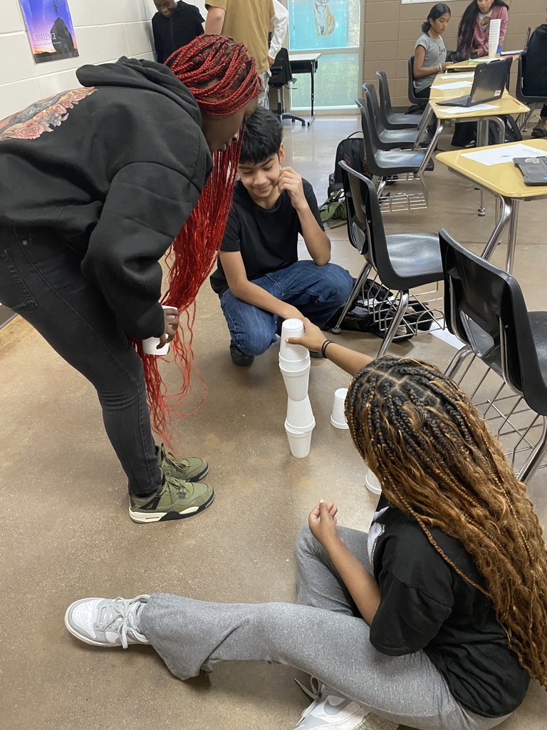 Hands-on Math Fun...Using cups to guess teacher's height