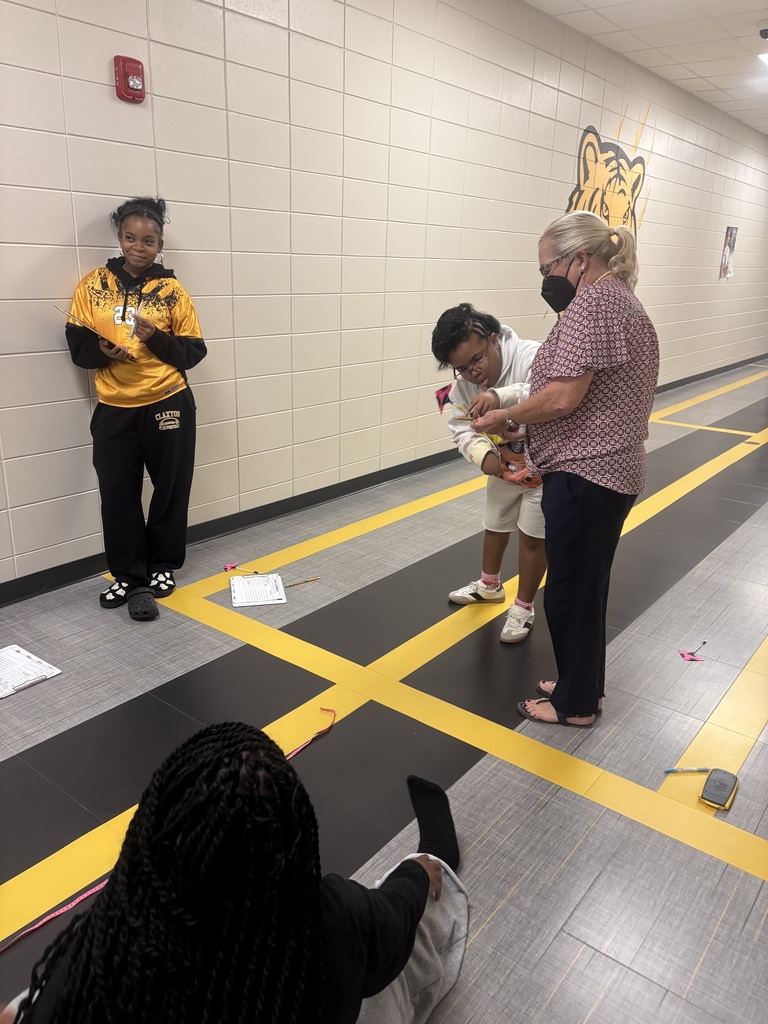 Image shows 🎯🏹 In Mrs. Selph's and Mrs. Cook’s College Readiness Math class, our CHS Tigers became engineers for the day! Students designed their own bow & arrow models, then identified independent and dependent variables through trial testing. 📊 After collecting their data, they built bar graphs and analyzed results, connecting scientific thinking, math skills, and real-world applications in a hands-on engineering challenge.  🐾💛🖤 We are proud of our Tigers for taking aim at success through learning and discovery!  #ClaxtonHigh #TigerPride #STEM #HandsOnLearning #BlackAndGold #FutureEngineers