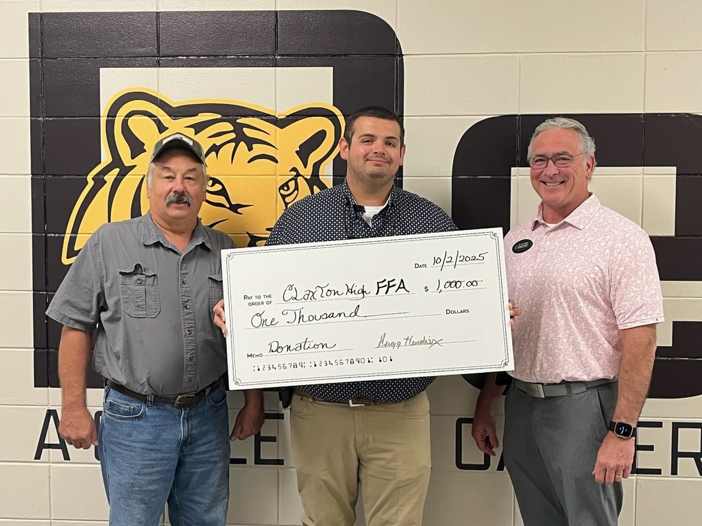 Image showing 🎉👏 A huge THANK YOU to Evans County Farm Bureau for their incredible support of the Claxton High School FFA program! 🐾💛🖤  Recently, Mr. Gregg Hendrix, president of the Evans County Farm Bureau, presented FFA Advisor Chase Turner and CHS Principal Dr. Paul Mizell with a generous $1000 donation 💵🙌 to help fund FFA programs and activities. 🌱📚✨  We are so grateful for the continued support from our community—it truly makes a difference for our students! 💪💛🖤  #TheDen #ClaxtonHighSchool #BlackAndGold #CommunitySupport #CHSFFA