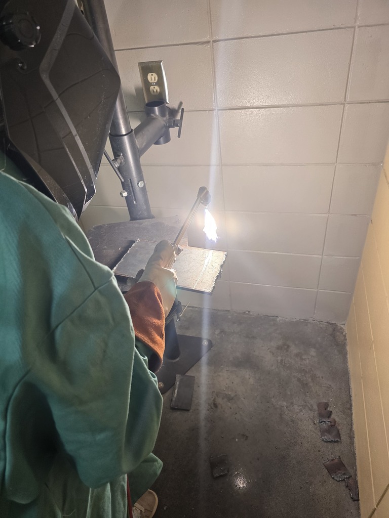 Image showing 👨‍🏭🔥Mr. Chase Turner’s Agriculture Mechanics class at CHS is learning the importance of proper Personal Protective Equipment (PPE) ✅ and what does NOT count as PPE 🚫. Students began hands-on training with the cutting torch by practicing safe techniques while cutting metal. 🔥They have also learned how to use a cutting torch on different thicknesses of metal, building skill and confidence with every cut! 💪⚙️  Way to go, Tigers! 🐅💛🖤  #TheDEN #ClaxtonHighSchool #Tigers #BlackAndGold #AgMechanics #HandsOnLearning #PPE #SafetyFirst #CTAE