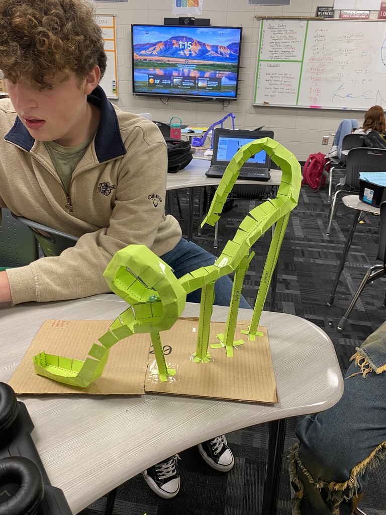 Image showing 🎢🎢 Coach Transue’s Advanced Algebra students are taking math to new heights! 🎢🎢 This week, they wrapped up their unit on quadratic equations with an exciting Summative Assessment Challenge — using parabolas to design and build marble roller coasters! 🎢💫 Students had to create and adjust their roller coasters to meet one of three challenges: 1️⃣ Successfully pass through a vertical loop 2️⃣ Successfully pass through a horizontal loop 3️⃣ Successfully make it over an incline Hands-on learning meets creative problem solving — and these Tigers were up for the challenge! 💪🐯🖤💛 #Tigers #STEM #MathInAction #HandsOnLearning #EvansCountyCharter #AdvancedAlgebra #QuadraticEquations #LearningIsFun #BlackAndGoldPride