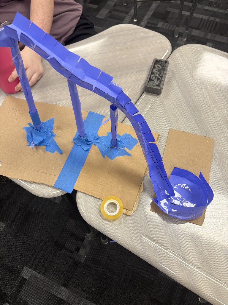 Image showing 🎢🎢 Coach Transue’s Advanced Algebra students are taking math to new heights! 🎢🎢 This week, they wrapped up their unit on quadratic equations with an exciting Summative Assessment Challenge — using parabolas to design and build marble roller coasters! 🎢💫 Students had to create and adjust their roller coasters to meet one of three challenges: 1️⃣ Successfully pass through a vertical loop 2️⃣ Successfully pass through a horizontal loop 3️⃣ Successfully make it over an incline Hands-on learning meets creative problem solving — and these Tigers were up for the challenge! 💪🐯🖤💛 #Tigers #STEM #MathInAction #HandsOnLearning #EvansCountyCharter #AdvancedAlgebra #QuadraticEquations #LearningIsFun #BlackAndGoldPride