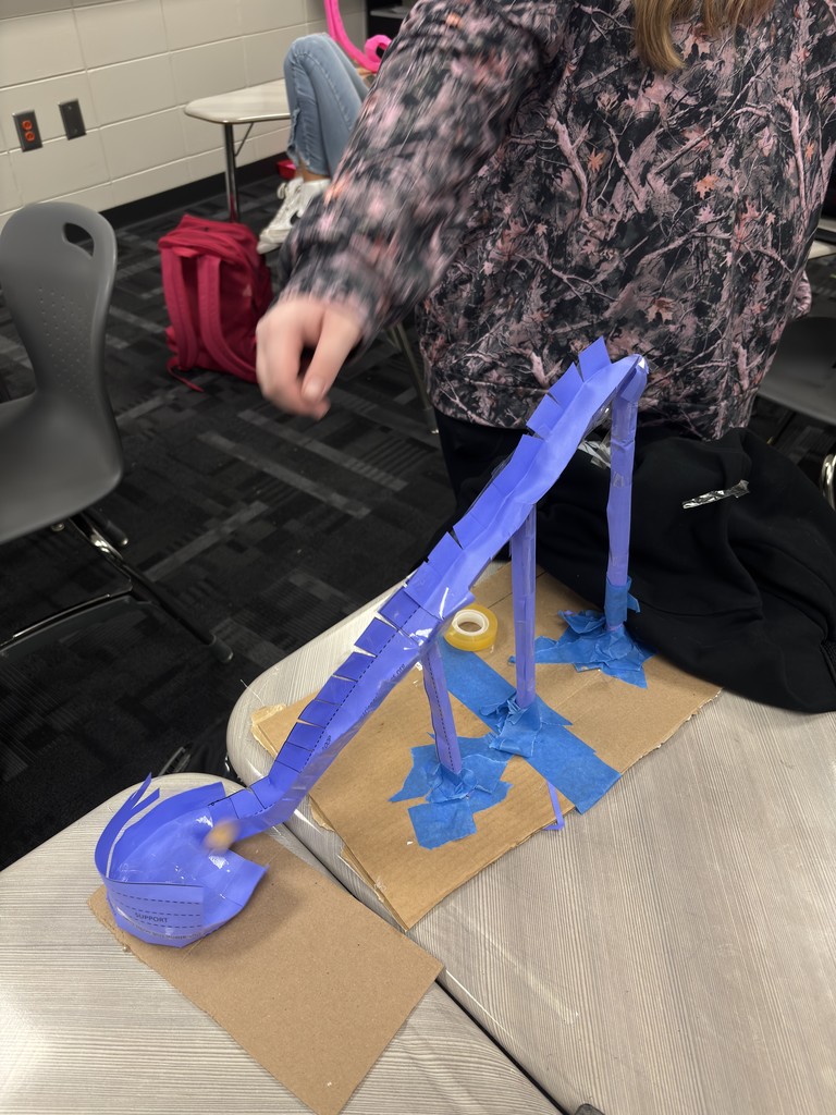 Image showing 🎢🎢 Coach Transue’s Advanced Algebra students are taking math to new heights! 🎢🎢 This week, they wrapped up their unit on quadratic equations with an exciting Summative Assessment Challenge — using parabolas to design and build marble roller coasters! 🎢💫 Students had to create and adjust their roller coasters to meet one of three challenges: 1️⃣ Successfully pass through a vertical loop 2️⃣ Successfully pass through a horizontal loop 3️⃣ Successfully make it over an incline Hands-on learning meets creative problem solving — and these Tigers were up for the challenge! 💪🐯🖤💛 #Tigers #STEM #MathInAction #HandsOnLearning #EvansCountyCharter #AdvancedAlgebra #QuadraticEquations #LearningIsFun #BlackAndGoldPride