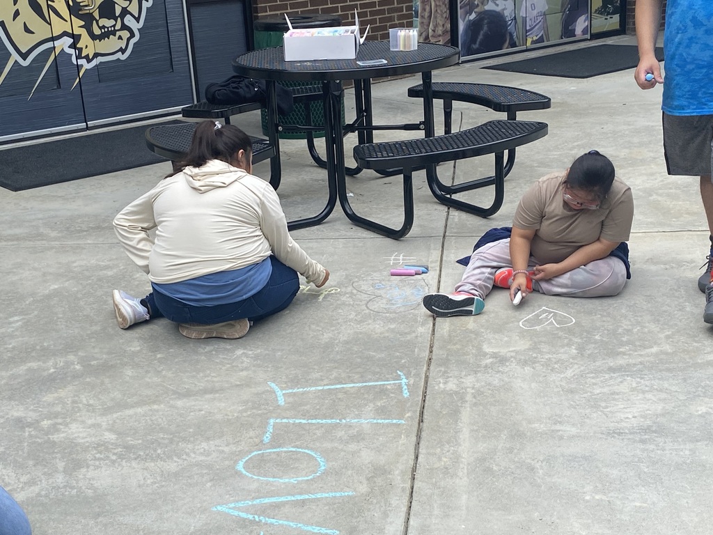 Image showing 🖍️🤩 CHS students in Ms. Johnson's and Ms. McNeal's class took to the sidewalks, using sidewalk chalk to express themselves.🤩🖍️ #ExpressYourself #StudentLife #OutdoorFun #ImaginationUnleashed