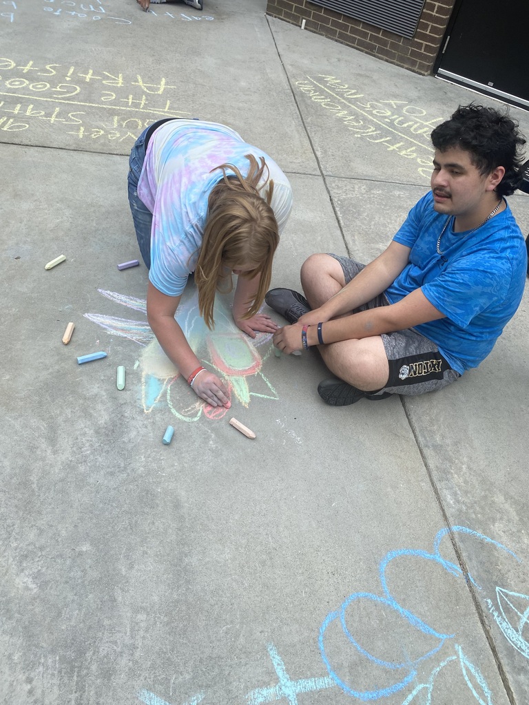 Image showing 🖍️🤩 CHS students in Ms. Johnson's and Ms. McNeal's class took to the sidewalks, using sidewalk chalk to express themselves.🤩🖍️ #ExpressYourself #StudentLife #OutdoorFun #ImaginationUnleashed