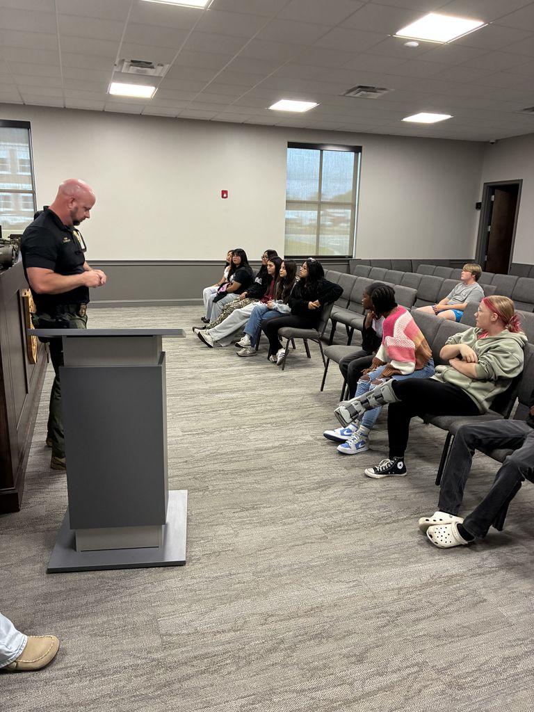 Image showing CHS Students Get a Behind-the-Scenes Look at Public Safety! 🚨 Our Claxton High School freshmen had an amazing field trip, visiting the Claxton Police Department and the Claxton Public Safety Complex. Students learned firsthand about patrol operations, communications, and community policing from Chief Kirkland, Lt. McKinnon, and SRO Smith. They also got an up-close look at fire equipment and emergency procedures thanks to Deputy Fire Chief Croft! 🚒 As Coach McLean said, "This experience gave our students a real look at the people and systems that protect our community every day.” #TheDEN #ClaxtonTigers #CommunityPolicing #FireSafety #CareerConnections #RealWorldLearning 👮♀️🔥