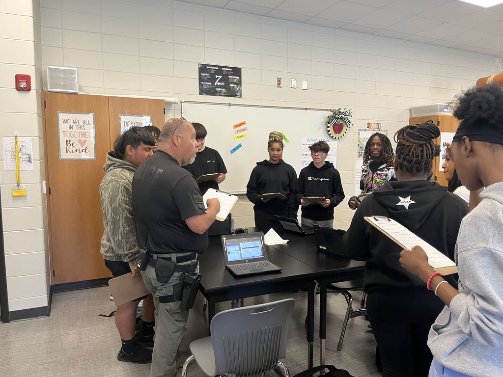 Image showing CHS Transition Students are on Patrol! 🚨 Our Transition students took a hands-on approach to learning about campus security, emphasizing observation, communication, and safety awareness. After mastering patrol procedures and key vocabulary, they conducted real-time "security patrols," checking doors, identifying hazards, and marking safe areas on their maps. 🧭 The best part? They got to share their findings and ask questions directly to School Resource Officer Ron Smith and CHS assistant principal Randy Cooper This activity underscored the importance of responsibility, teamwork, and keeping our school safe. Great job, security team! 👍 #TheDEN #CHSTransition #SchoolSafety #CampusSecurity #SRO #RealWorldSkills #CommunityPartnership 👮♂️