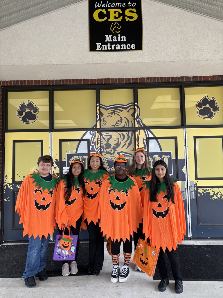 FCCLA Officers dressed in pumpkin costumes