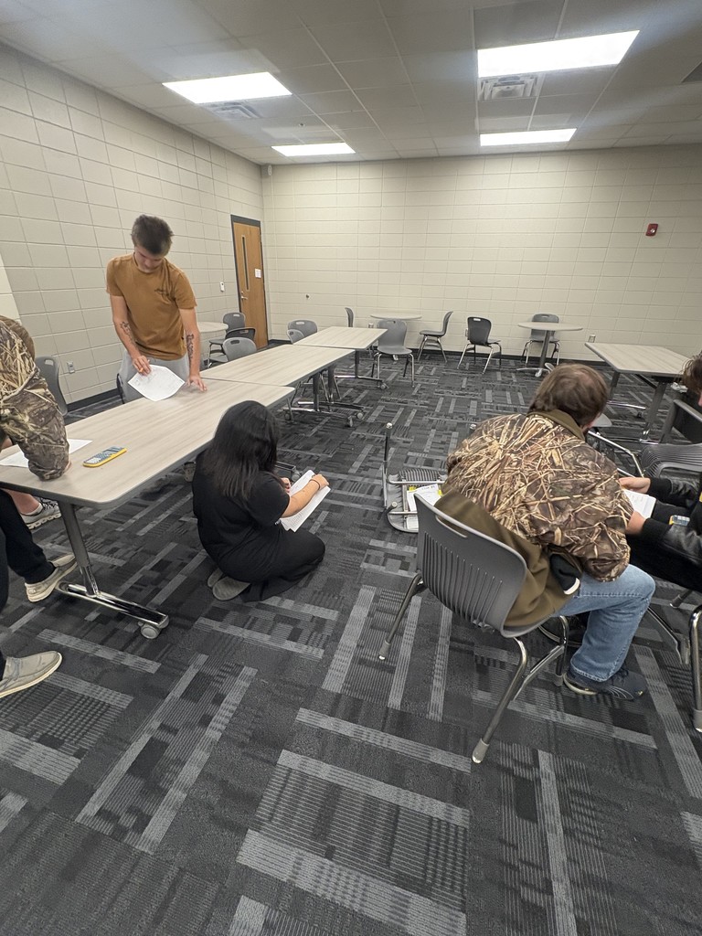 Image showing WHO 🔪 WHAT 🧠 WHERE 🧐 Students were deep into the ultimate math mystery! Ms. Selph's class turned into a detective agency, working in groups to solve the case of "The Murder of Ms. Selph." 🖤💛 To crack the clues—the suspect, the weapon, and the location—students had to correctly solve challenging conditional probability problems hidden throughout the room! It was a fantastic, hands-on application of complex math concepts. Great work, detectives! Way to use your brains to save the day (and learn math)! 🖤💛 #ConditionalProbability #MathMystery #SelphClass #EngagingMath #STEM 🔎