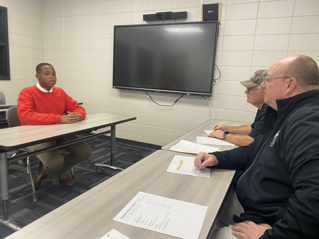 Students participating in interview.