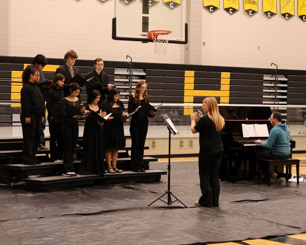 Image showing CHS Honors Our Heroes! A Day of Deep Gratitude 🌟 Claxton High School and the history department hosted a deeply meaningful Veterans Day program Tuesday, November 1, 2025, to honor those who have served. 🏫 The day began bright and early with a special breakfast 🥓☕ for the veterans, a small token of our immense appreciation.  Our guest speaker, 2nd Lt. Jordan Hendrix (Platoon Leader, 3rd ID, Ft. Stewart), delivered a powerful message on selfless service 🛡️, emphasizing that true dedication happens not just on the battlefield but also in the quiet moments of daily life. He encouraged our students to live with purpose and "do what is right, even when no one is watching." 💪  The program featured heartfelt tributes from our talented students (Mila Sapp, Emmie Stanfield, Victor Fuentes, Kaydence Snellgrove, Jordan Brown) and inspiring performances by the CHS Band 🎶🎺 and Chorus 🎤. The ceremony culminated with the band’s moving Salute to Armed Forces, where we proudly recognized the veterans from each service branch present with a big round of applause! 👏  Thank you to all our veterans for your service and sacrifice! 🙏 Your commitment inspires us all. 💖  #CHSVeteransDay #ThankYouVets #SelflessService #ClaxtonHigh #LivingWithPurpose #GAStrong #MilitaryAppreciation #Honor 🦅  Pictures courtesy of Gregory Crosby, Dylan Tidwell, and Glenn Lewis