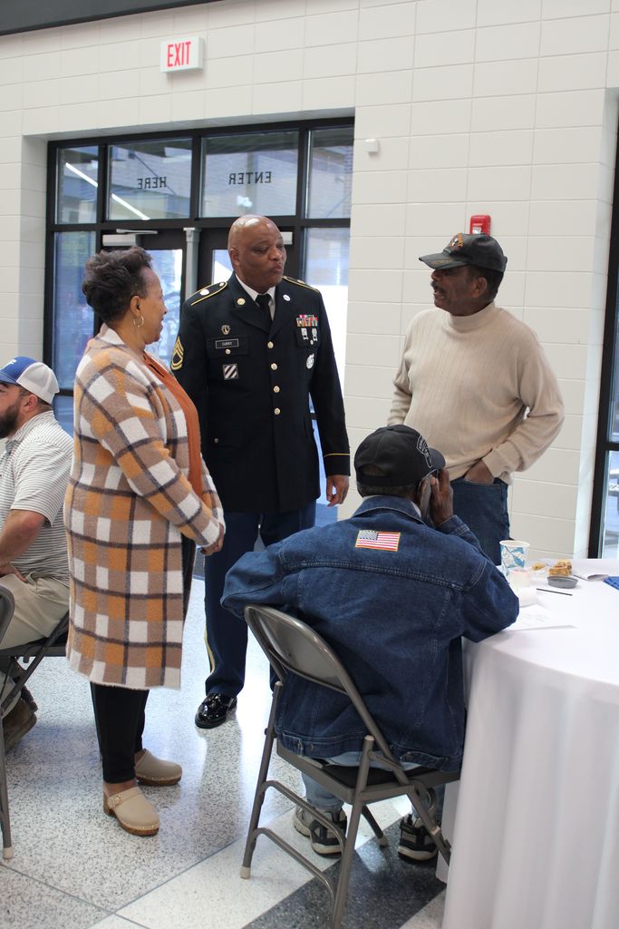 Image showing CHS Honors Our Heroes! A Day of Deep Gratitude 🌟 Claxton High School and the history department hosted a deeply meaningful Veterans Day program Tuesday, November 1, 2025, to honor those who have served. 🏫 The day began bright and early with a special breakfast 🥓☕ for the veterans, a small token of our immense appreciation.  Our guest speaker, 2nd Lt. Jordan Hendrix (Platoon Leader, 3rd ID, Ft. Stewart), delivered a powerful message on selfless service 🛡️, emphasizing that true dedication happens not just on the battlefield but also in the quiet moments of daily life. He encouraged our students to live with purpose and "do what is right, even when no one is watching." 💪  The program featured heartfelt tributes from our talented students (Mila Sapp, Emmie Stanfield, Victor Fuentes, Kaydence Snellgrove, Jordan Brown) and inspiring performances by the CHS Band 🎶🎺 and Chorus 🎤. The ceremony culminated with the band’s moving Salute to Armed Forces, where we proudly recognized the veterans from each service branch present with a big round of applause! 👏  Thank you to all our veterans for your service and sacrifice! 🙏 Your commitment inspires us all. 💖  #CHSVeteransDay #ThankYouVets #SelflessService #ClaxtonHigh #LivingWithPurpose #GAStrong #MilitaryAppreciation #Honor 🦅  Pictures courtesy of Gregory Crosby, Dylan Tidwell, and Glenn Lewis
