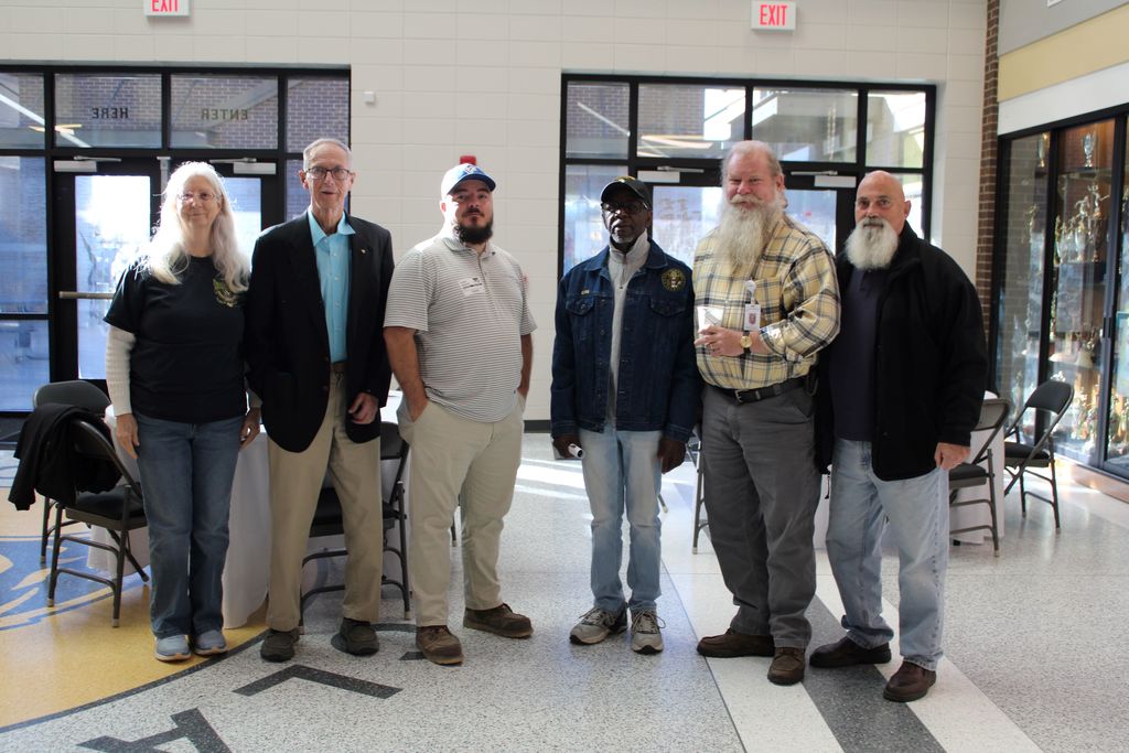 Image showing CHS Honors Our Heroes! A Day of Deep Gratitude 🌟 Claxton High School and the history department hosted a deeply meaningful Veterans Day program Tuesday, November 1, 2025, to honor those who have served. 🏫 The day began bright and early with a special breakfast 🥓☕ for the veterans, a small token of our immense appreciation.  Our guest speaker, 2nd Lt. Jordan Hendrix (Platoon Leader, 3rd ID, Ft. Stewart), delivered a powerful message on selfless service 🛡️, emphasizing that true dedication happens not just on the battlefield but also in the quiet moments of daily life. He encouraged our students to live with purpose and "do what is right, even when no one is watching." 💪  The program featured heartfelt tributes from our talented students (Mila Sapp, Emmie Stanfield, Victor Fuentes, Kaydence Snellgrove, Jordan Brown) and inspiring performances by the CHS Band 🎶🎺 and Chorus 🎤. The ceremony culminated with the band’s moving Salute to Armed Forces, where we proudly recognized the veterans from each service branch present with a big round of applause! 👏  Thank you to all our veterans for your service and sacrifice! 🙏 Your commitment inspires us all. 💖  #CHSVeteransDay #ThankYouVets #SelflessService #ClaxtonHigh #LivingWithPurpose #GAStrong #MilitaryAppreciation #Honor 🦅  Pictures courtesy of Gregory Crosby, Dylan Tidwell, and Glenn Lewis
