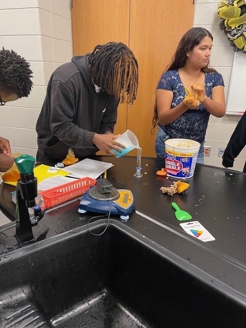 Image showing What's inside a pumpkin? Ask Mrs. Minis' Biology class! 🧠 Students spent time exploring the molecular building blocks of life by performing a hands-on lab to extract DNA from pumpkins. This simple yet powerful experiment helped them visualize DNA strands and reinforce their genetics lessons. After their lab, they enjoyed some fun carving time. Excellent job combining learning and celebration! 🖤🧡 #BiologyLab #DNAExtraction #MinisClass #ScienceEducation