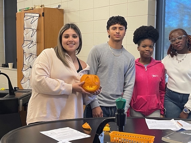 Image showing What's inside a pumpkin? Ask Mrs. Minis' Biology class! 🧠 Students spent time exploring the molecular building blocks of life by performing a hands-on lab to extract DNA from pumpkins. This simple yet powerful experiment helped them visualize DNA strands and reinforce their genetics lessons. After their lab, they enjoyed some fun carving time. Excellent job combining learning and celebration! 🖤🧡 #BiologyLab #DNAExtraction #MinisClass #ScienceEducation
