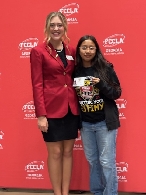 Image showing CHS FCCLA Shines at Fall Leadership Conference! ✨ Claxton High FCCLA recently returned from the Georgia FCCLA Fall Leadership Conference in Covington, GA! Our students spent time on critical leadership and team-building activities, goal-setting, and exploring competition opportunities. 🖤💛 A massive congratulations to Allison Martinez, who was recognized during the closing ceremony for achieving a passing score on the challenging Statesman Exam! Way to go, Allison! We are proud of all our leaders! 👏 #TheDEN #ClaxtonFCCLA #GAFCCLA #FallLeadership #StatesmanExam #StudentLeaders