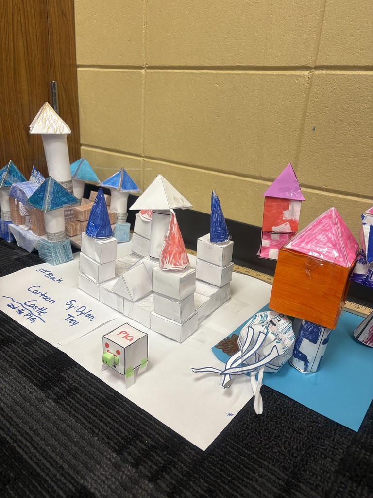 Image showing Geometry Comes to Life! 🏰🐉  Students in Mrs. Selph's, Mrs. Cook's, and Mrs. Francis's Geometry classes recently wrapped up an exciting hands-on project that combined math, storytelling, and design!  Using their knowledge of volume, surface area, and dilations, students created custom 3D castles and critters from self-designed nets. Each model was paired with a unique narrative story, bringing their mathematical creations to life through creativity and imagination. This project truly shows that math is all around us! 📐✨  #Geometry #MathIsFun #VolumeAndSurfaceArea #Dilations #HandsOnLearning 🖤💛