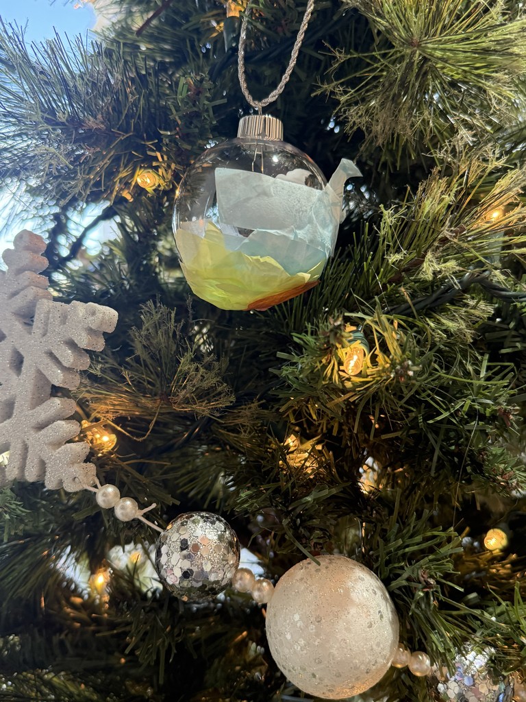 Image showing ✨Please visit the Evans County Downtown Development Authority's Festival of Trees hosted by Claxton City Hall to see the tree decorated with beautiful, custom ornaments made by the dedicated CMS/CHS Special Olympics athletes during the fall games. The Festival of Trees is on display at City Hall through January 2, 2026 during business hours (Mondays- Thursdays 8:15-4:30 and Fridays 8:15-12:00).  #HolidaySeason #AthleteArt #ClaxtonCityHall #FestiveOfTrees 🎄