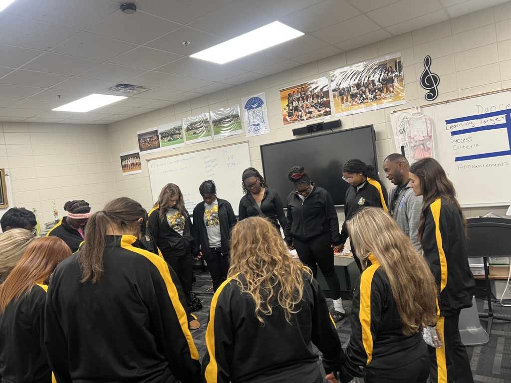 Morning Prayer with Coach Maurice and Cheerleaders before traveling