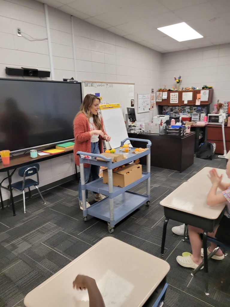 Pictures of Harvest of the Month citrus lesson in Ms. Kearney's class.