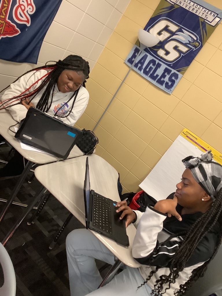 Students using iCivics for a task in class.