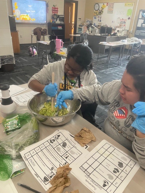 Image showing Guacamole, Cupcakes, and Great Teamwork! 🥑🧁  The CHS peer group had a busy and productive day in the kitchen! The group worked together to prepare a student-selected menu of fresh guacamole and delicious cupcakes.  While the food was fantastic, the real focus was on mastering the "ingredients" of a successful team. Students practiced:  Clear Communication: Keeping everyone on the same page.  Mutual Support: Helping teammates cross the finish line.  Organization: Maintaining a tidy and efficient workspace.  By staying organized and supporting one another, our students ensured a smooth and efficient food prep process. Great job to all our student chefs! 🖤💛  #LifeSkills #Teamwork #KitchenSkills #StudentSelected #TigerPride