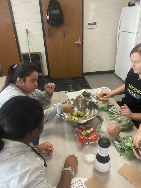 Image showing Guacamole, Cupcakes, and Great Teamwork! 🥑🧁  The CHS peer group had a busy and productive day in the kitchen! The group worked together to prepare a student-selected menu of fresh guacamole and delicious cupcakes.  While the food was fantastic, the real focus was on mastering the "ingredients" of a successful team. Students practiced:  Clear Communication: Keeping everyone on the same page.  Mutual Support: Helping teammates cross the finish line.  Organization: Maintaining a tidy and efficient workspace.  By staying organized and supporting one another, our students ensured a smooth and efficient food prep process. Great job to all our student chefs! 🖤💛  #LifeSkills #Teamwork #KitchenSkills #StudentSelected #TigerPride