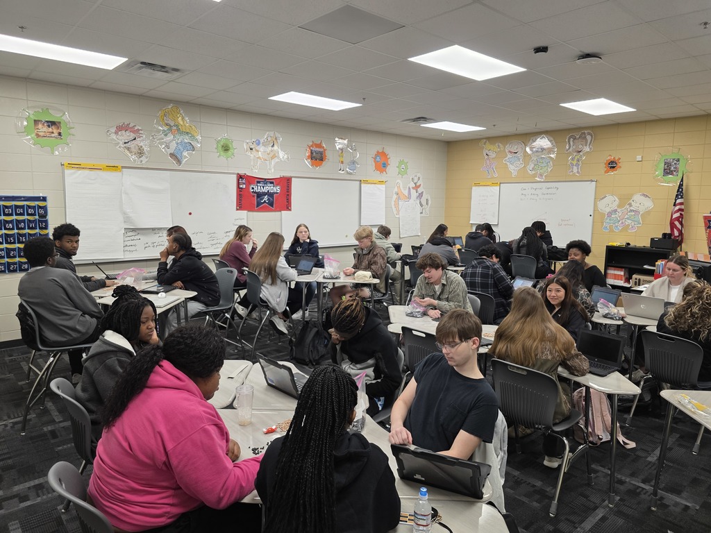 Image showing 🧟‍♂️ Modeling the "Zombie Apocalypse" in Advanced Algebra! 📊  Is it a movie set? No, it's math class! Coach Transue’s Advanced Algebra students are currently mastering exponential functions by simulating a zombie virus outbreak.  Using a population simulation with different markers, students tracked how a single "infection" can spread through a crowd. By shaking the population bags and recording how many new "zombies" appeared in each round, students were able to visualize:  Exponential Growth: How quickly a virus can spread through a healthy population.  Exponential Decay: The rapid reduction of the healthy population over time.  It was a fantastic, hands-on way to turn abstract equations into real-world (and fictional-world!) data. Great job, Tigers! 🖤💛  #AdvancedAlgebra #ExponentialGrowth #MathSimulation #HandsOnLearning