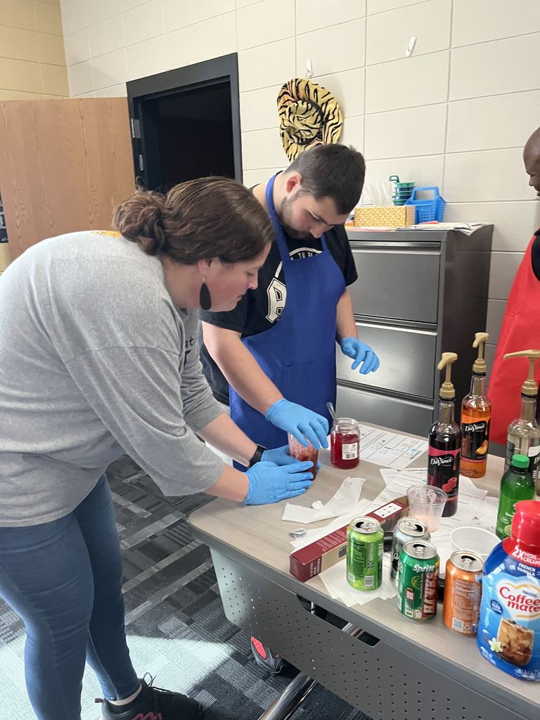 Image showing Beyond the Worksheet: Real-World Budgeting in Ms. Johnson’s Class 📉💰  If you walk by Ms. Johnson’s room, you might see students hard at work on creating various beverages for the Drink Cart orders that faculty and staff have ordered, but the real magic is happening behind the scenes with the students' monthly budgets.  Students are learning that a paycheck is more than just spending money—it's about responsibility. By using the "earnings" from their time working at the Drink Cart to pay for simulated "living expenses" (rent, phone bills, and utilities), they are developing the habits they need for life after graduation.  Once the bills are settled, the remaining "profit" can be used for snacks and drinks. This hands-on approach to budgeting turns abstract math into a tangible life skill. Great job, Ms. Johnson. Ms. Martin, Ms. McNeal, and students! We hear from faculty and staff that the drinks are delicious!  #Adulting101 #BudgetingSkills #CareerPrep #TigerPride