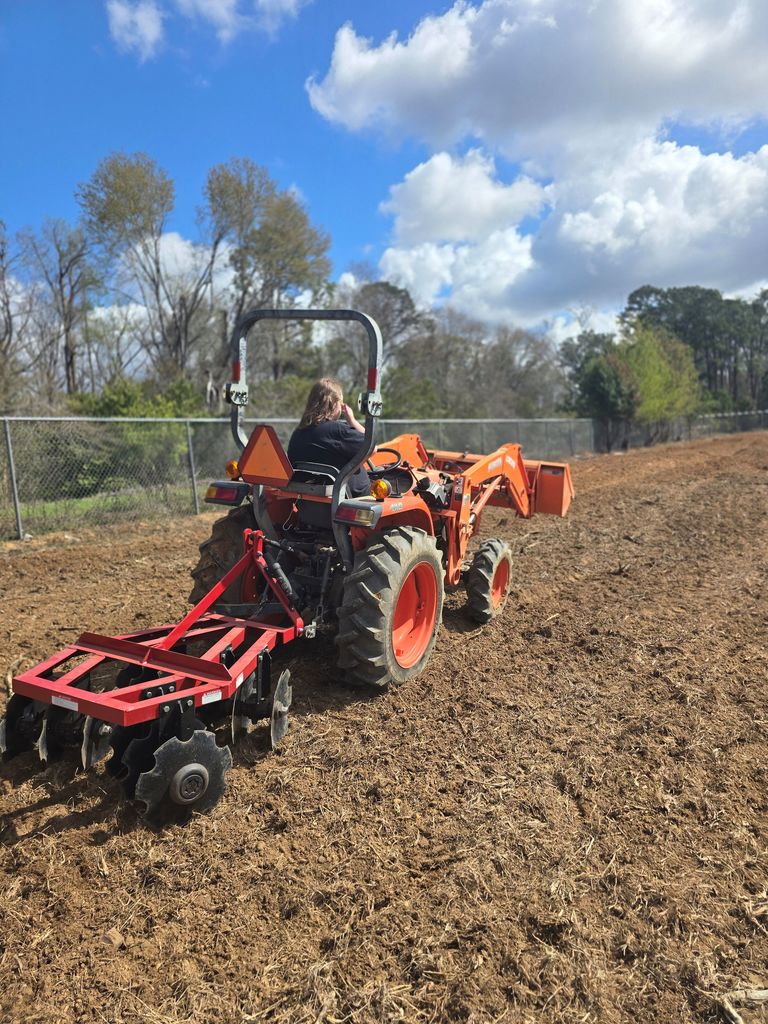 Image showing 🚜 Breaking Ground: Ag Mech 2 is Heading to the Field! 🌱  Spring is just around the corner, and our Ag Mechanics 2 students are making sure The DEN is ready! This week, students moved from the classroom to the tractor seat to begin prepping the soil for our springtime grass planting.  This hands-on lesson focused on the mastery of the three-point harrow. Operating a tractor while pulling an implement requires a high level of coordination and a "safety-first" mindset. Our Tigers aren't just driving; they are learning the technical side of agriculture, including:  Safe Operating Procedures: Mastering the "rules of the road" for agricultural machinery.  Hitch Mastery: Identifying tractor parts and the complex mechanics of attaching and removing implements.  Precision Prep: Using the harrow to break ground effectively for optimal planting conditions.  We are proud to see our students applying their classroom knowledge to real-world tasks! 🐯🖤💛  #TheDEN #AgMechanics #HandsOnLearning #FutureFarmers #TractorSafety #ClaxtonHigh