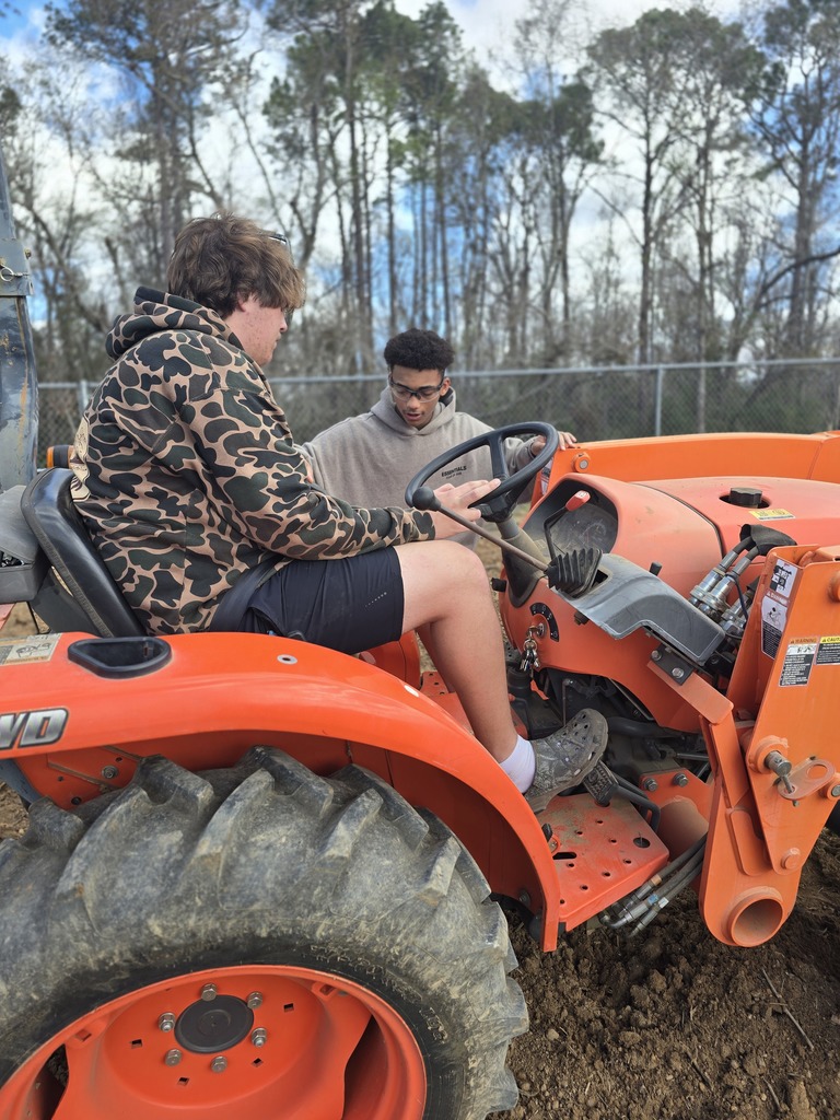 Image showing 🚜 Breaking Ground: Ag Mech 2 is Heading to the Field! 🌱  Spring is just around the corner, and our Ag Mechanics 2 students are making sure The DEN is ready! This week, students moved from the classroom to the tractor seat to begin prepping the soil for our springtime grass planting.  This hands-on lesson focused on the mastery of the three-point harrow. Operating a tractor while pulling an implement requires a high level of coordination and a "safety-first" mindset. Our Tigers aren't just driving; they are learning the technical side of agriculture, including:  Safe Operating Procedures: Mastering the "rules of the road" for agricultural machinery.  Hitch Mastery: Identifying tractor parts and the complex mechanics of attaching and removing implements.  Precision Prep: Using the harrow to break ground effectively for optimal planting conditions.  We are proud to see our students applying their classroom knowledge to real-world tasks! 🐯🖤💛  #TheDEN #AgMechanics #HandsOnLearning #FutureFarmers #TractorSafety #ClaxtonHigh
