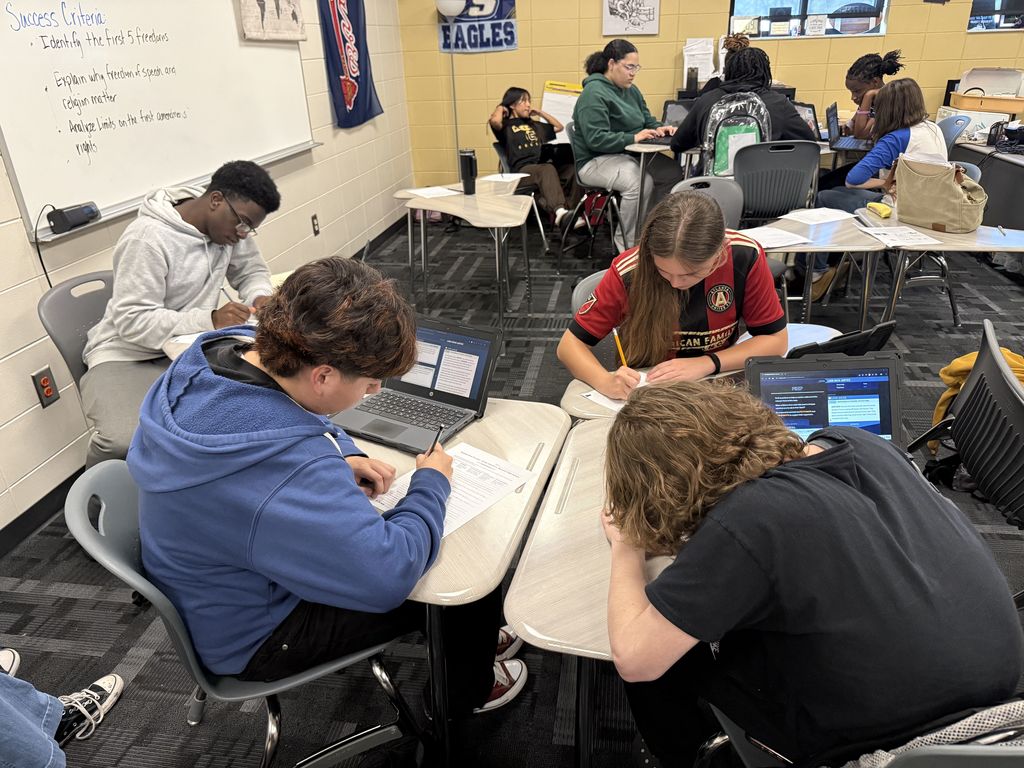 Image showing ⚖️ Order in the Court: Coach Lanier’s Class Takes on the Supreme Court! 🏛️ What happens when a peaceful protest turns chaotic, and a student is suspended without a chance to tell her side of the story? That was the high-stakes scenario facing Coach Lanier’s students recently! After studying Civil Rights, Civil Liberties, and Due Process, our Tigers put their knowledge to the test using an interactive iCivics court simulation. The case centered on a student’s right to a fair process and whether her school overstepped when they suspended her for carrying a protest sign. The Courtroom Roles: The Defense: Arguing for the school’s right to maintain order. The Plaintiff: Fighting for the student's right to due process and free speech. The Supreme Court Justices: Reviewing the arguments and making the final ruling. This simulation was a powerful way to bridge the gap between our current unit and the Judicial Branch, showing exactly how the Supreme Court functions as an appellate court. Our students did an incredible job researching their positions and preparing for "heated" counter-arguments! 🐯🖤💛 #CivicsInAction #iCivics #DueProcess #SupremeCourt #FutureLawyers #TigerPride