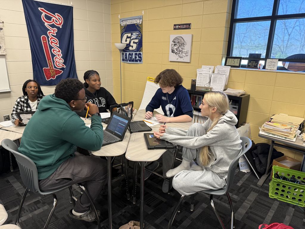 Image showing ⚖️ Order in the Court: Coach Lanier’s Class Takes on the Supreme Court! 🏛️ What happens when a peaceful protest turns chaotic, and a student is suspended without a chance to tell her side of the story? That was the high-stakes scenario facing Coach Lanier’s students recently! After studying Civil Rights, Civil Liberties, and Due Process, our Tigers put their knowledge to the test using an interactive iCivics court simulation. The case centered on a student’s right to a fair process and whether her school overstepped when they suspended her for carrying a protest sign. The Courtroom Roles: The Defense: Arguing for the school’s right to maintain order. The Plaintiff: Fighting for the student's right to due process and free speech. The Supreme Court Justices: Reviewing the arguments and making the final ruling. This simulation was a powerful way to bridge the gap between our current unit and the Judicial Branch, showing exactly how the Supreme Court functions as an appellate court. Our students did an incredible job researching their positions and preparing for "heated" counter-arguments! 🐯🖤💛 #CivicsInAction #iCivics #DueProcess #SupremeCourt #FutureLawyers #TigerPride