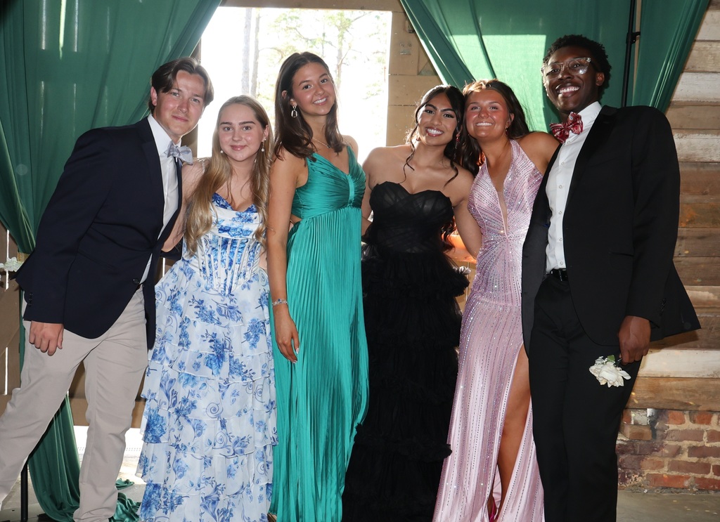 Image showing 🌲✨ Magic in the Forest: A Night to Remember! ✨🌲  Claxton High School juniors and seniors and their dates celebrated Prom at the beautiful Dutch Ford Farm in Metter on Saturday, April 4. Under the theme "Enchanted Forest," our students kicked off Spring Break in style!  The evening was a true community effort. Guests enjoyed a delicious spread of refreshments prepared by our very own CHS Culinary Arts students, led by the talented Mrs. Cindy Hart. The venue was truly transformed into a magical woodland escape thanks to the incredible eye for detail of Mr. Maurice Burney.  👑 2026 Prom Royalty 👑 The highlight of the night was the crowning of our court! Please join us in congratulating:  Prom Queen: Makenzy Bacon  Prom King: Ezra Davis  Prom Princess: Jakyla Williams  Prom Prince: Brody Dillard  Thank you to everyone who worked behind the scenes to make this a safe and spectacular night for our Tigers. We hope everyone had a restful and "enchanted" Spring Break! 🐯🖤💛  #TheDEN #Prom2026 #EnchantedForest #TigerPride #ClaxtonHighSchool
