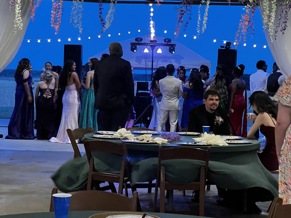 Image showing 🌲✨ Magic in the Forest: A Night to Remember! ✨🌲  Claxton High School juniors and seniors and their dates celebrated Prom at the beautiful Dutch Ford Farm in Metter on Saturday, April 4. Under the theme "Enchanted Forest," our students kicked off Spring Break in style!  The evening was a true community effort. Guests enjoyed a delicious spread of refreshments prepared by our very own CHS Culinary Arts students, led by the talented Mrs. Cindy Hart. The venue was truly transformed into a magical woodland escape thanks to the incredible eye for detail of Mr. Maurice Burney.  👑 2026 Prom Royalty 👑 The highlight of the night was the crowning of our court! Please join us in congratulating:  Prom Queen: Makenzy Bacon  Prom King: Ezra Davis  Prom Princess: Jakyla Williams  Prom Prince: Brody Dillard  Thank you to everyone who worked behind the scenes to make this a safe and spectacular night for our Tigers. We hope everyone had a restful and "enchanted" Spring Break! 🐯🖤💛  #TheDEN #Prom2026 #EnchantedForest #TigerPride #ClaxtonHighSchool