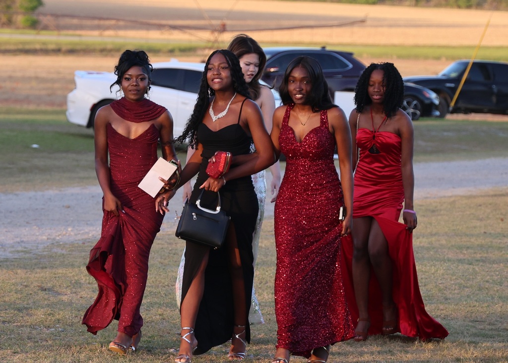 Image showing 🌲✨ Magic in the Forest: A Night to Remember! ✨🌲  Claxton High School juniors and seniors and their dates celebrated Prom at the beautiful Dutch Ford Farm in Metter on Saturday, April 4. Under the theme "Enchanted Forest," our students kicked off Spring Break in style!  The evening was a true community effort. Guests enjoyed a delicious spread of refreshments prepared by our very own CHS Culinary Arts students, led by the talented Mrs. Cindy Hart. The venue was truly transformed into a magical woodland escape thanks to the incredible eye for detail of Mr. Maurice Burney.  👑 2026 Prom Royalty 👑 The highlight of the night was the crowning of our court! Please join us in congratulating:  Prom Queen: Makenzy Bacon  Prom King: Ezra Davis  Prom Princess: Jakyla Williams  Prom Prince: Brody Dillard  Thank you to everyone who worked behind the scenes to make this a safe and spectacular night for our Tigers. We hope everyone had a restful and "enchanted" Spring Break! 🐯🖤💛  #TheDEN #Prom2026 #EnchantedForest #TigerPride #ClaxtonHighSchool