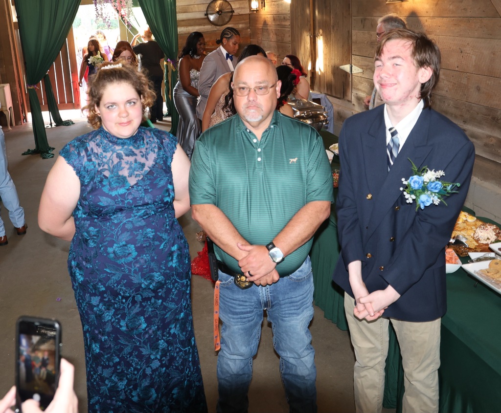 Image showing 🌲✨ Magic in the Forest: A Night to Remember! ✨🌲  Claxton High School juniors and seniors and their dates celebrated Prom at the beautiful Dutch Ford Farm in Metter on Saturday, April 4. Under the theme "Enchanted Forest," our students kicked off Spring Break in style!  The evening was a true community effort. Guests enjoyed a delicious spread of refreshments prepared by our very own CHS Culinary Arts students, led by the talented Mrs. Cindy Hart. The venue was truly transformed into a magical woodland escape thanks to the incredible eye for detail of Mr. Maurice Burney.  👑 2026 Prom Royalty 👑 The highlight of the night was the crowning of our court! Please join us in congratulating:  Prom Queen: Makenzy Bacon  Prom King: Ezra Davis  Prom Princess: Jakyla Williams  Prom Prince: Brody Dillard  Thank you to everyone who worked behind the scenes to make this a safe and spectacular night for our Tigers. We hope everyone had a restful and "enchanted" Spring Break! 🐯🖤💛  #TheDEN #Prom2026 #EnchantedForest #TigerPride #ClaxtonHighSchool