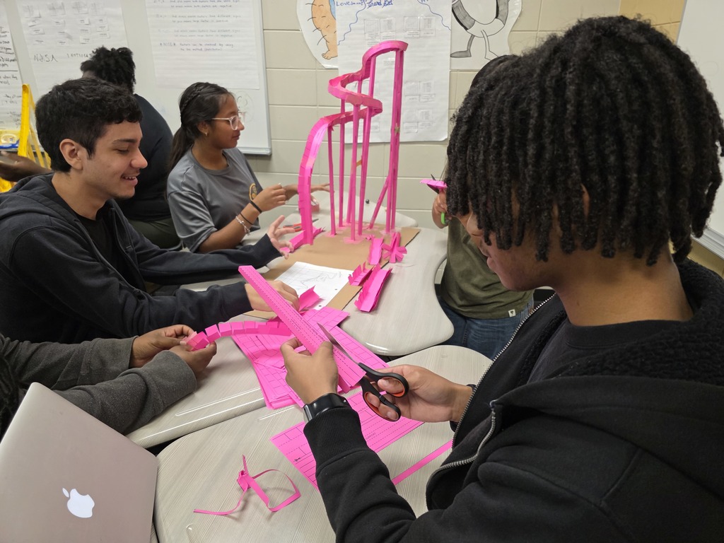 Image showing 📐 Engineering Excellence: Polynomials at Work 💻  In Mr. Transue’s Advanced Algebra class, students are learning that polynomials are the building blocks of the world around us—including our favorite theme park rides!  To successfully complete their roller coaster project, students had to use graphing technology to create a "blueprint" of their track. They analyzed the peaks, valleys, and intercepts of their functions to predict how a marble would travel. The true test came during construction, where they had to account for real-world variables like friction and gravity.  Whether they were tackling the Vertical Loop or ensuring a marble survived a high-speed valley, these Tigers proved that they have the grit and the mathematical mind to solve complex engineering problems.  #MathSkills #FutureEngineers #AdvancedAlgebra #DesmosMath #TigerPride