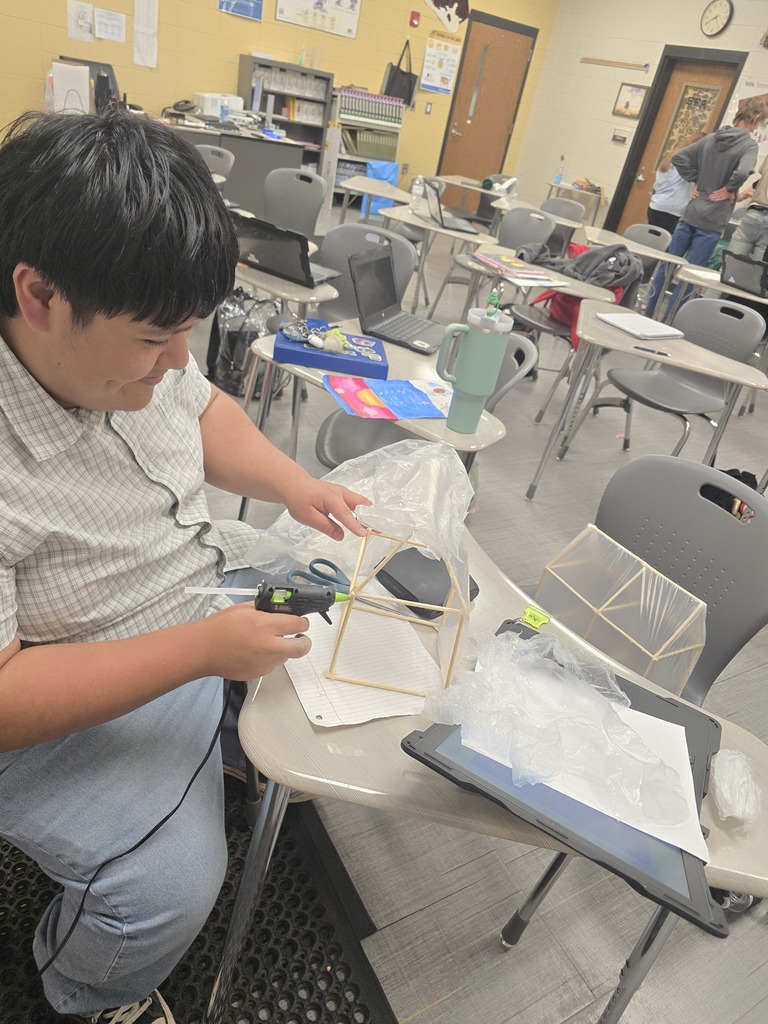 Image shows Mini Greenhouses, Major Skills! 🏗️🌱✨  Mr. Turner’s Horticulture students just leveled up! After studying different structural designs, they went hands-on to build their own mini greenhouses. 🔨  From frame design to climate control, these Tigers are learning exactly what it takes to keep a crop thriving. 🌡️🌿   #TheDEN #Horticulture #MiniGreenhouse #AgKids #ClaxtonHighSchool #HandsOnAg