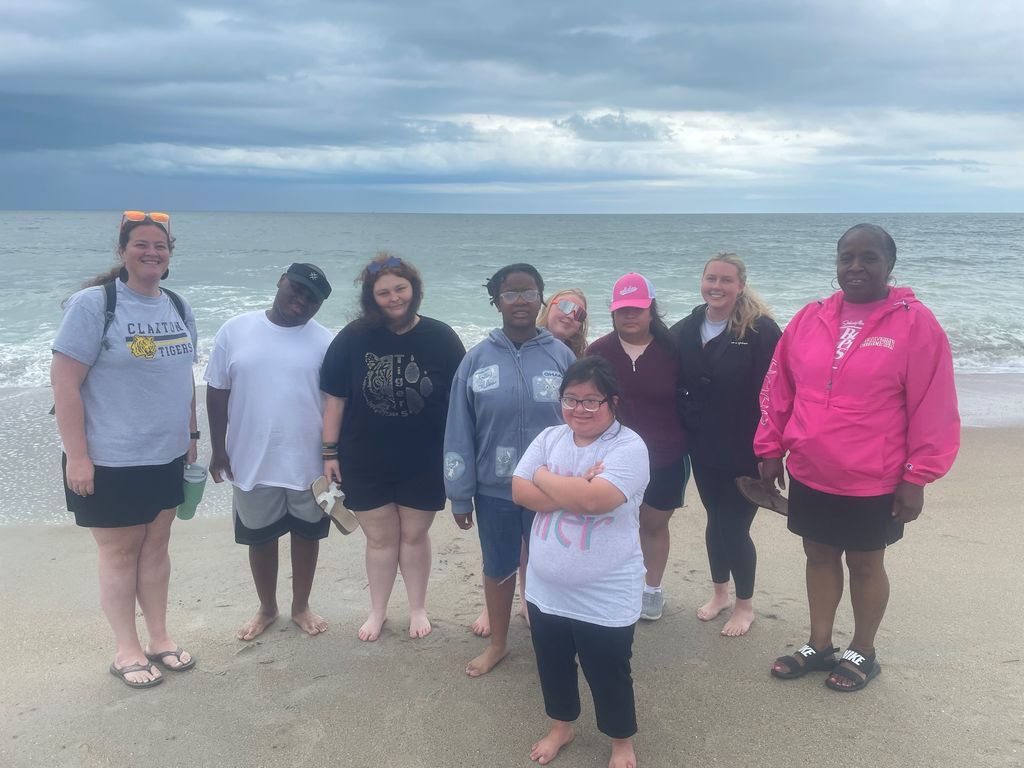 Image showing 🐚 Science, Sand, and Spectacular Memories 🐚  Who says learning only happens indoors? On Friday, May 1,  2026, students from the class of Ms. Johnson, Ms. McNeal, and Ms. Martin headed to Tybee Island for a deep dive into marine biology!  From sifting through the sand to find shore-dwelling creatures to exploring the galleries at the Marine Science Center, our students were true explorers. They didn't just read about the ecosystem—they felt the sand, smelled the salt air, and saw the wildlife firsthand.  Despite the rain during the beach portion of the trip, the smiles stayed bright. It was a day filled with discovery, teamwork, and the kind of memories that last a lifetime. Way to go, Tigers! 🐯🌊  #ClaxtonHigh #MarineBiology #TybeeIslandMSC #FieldTripFun #HandsOnScience