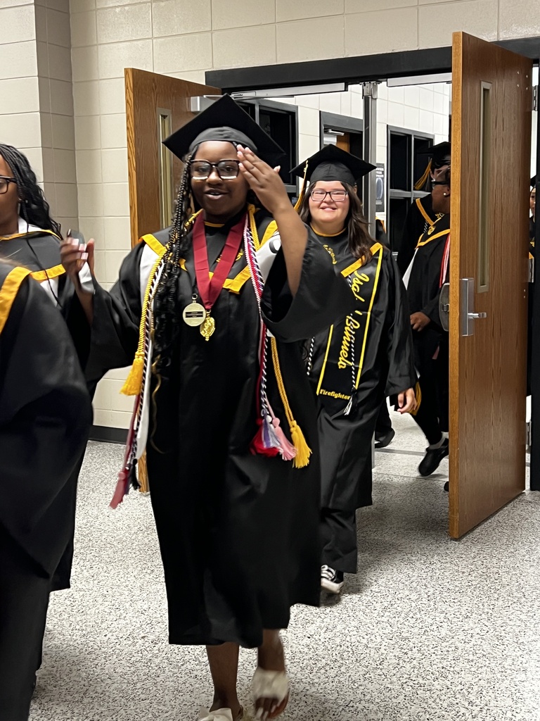 Image showing 🎓 One Last Walk, A Lifetime of Memories: The Class of 2026 Hall Walk 🎓  Today, Friday, May 15, 2026, the hallways of Evans County Schools were filled with a special kind of magic. Our seniors donned their graduation regalia and took their final walk through the schools that helped shape them into the young men and women they are today.  As they marched through the halls, they weren't just walking for themselves—they were walking for the elementary students who gave them high-fives and the middle schoolers who looked up with wide eyes. This tradition serves as a powerful reminder of what hard work and perseverance look like.  Why the Hall Walk matters:  Inspiring the Next Generation: Younger Tigers get to see exactly what their goal is.  A "Thank You" to Teachers: It’s a chance for former teachers to see how much their "little ones" have grown.  The Final Countdown: Tomorrow, these same students will cross Veterans Memorial Field as graduates!  Congratulations to the Class of 2026. You’ve left your mark on these halls, and we can’t wait to see you lead the way tomorrow! 🐯🖤💛  #TheDEN #ClassOf2026 #SeniorHallWalk #TigerLegacy #FullCircle #GraduationEve