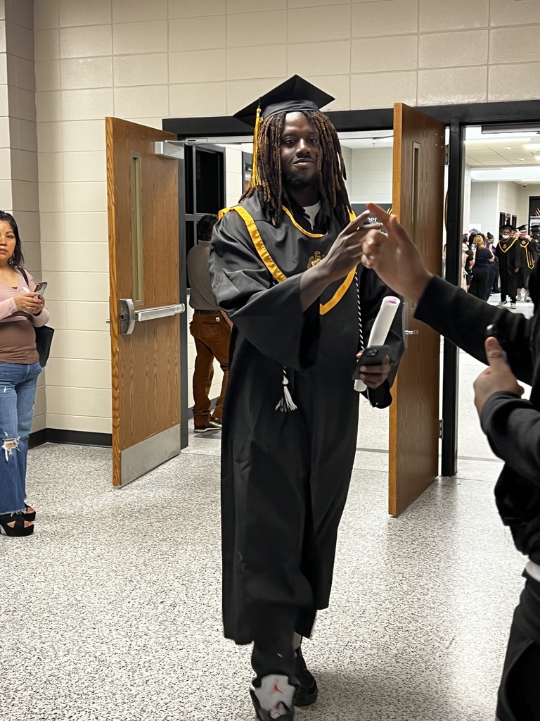 Image showing 🎓 One Last Walk, A Lifetime of Memories: The Class of 2026 Hall Walk 🎓  Today, Friday, May 15, 2026, the hallways of Evans County Schools were filled with a special kind of magic. Our seniors donned their graduation regalia and took their final walk through the schools that helped shape them into the young men and women they are today.  As they marched through the halls, they weren't just walking for themselves—they were walking for the elementary students who gave them high-fives and the middle schoolers who looked up with wide eyes. This tradition serves as a powerful reminder of what hard work and perseverance look like.  Why the Hall Walk matters:  Inspiring the Next Generation: Younger Tigers get to see exactly what their goal is.  A "Thank You" to Teachers: It’s a chance for former teachers to see how much their "little ones" have grown.  The Final Countdown: Tomorrow, these same students will cross Veterans Memorial Field as graduates!  Congratulations to the Class of 2026. You’ve left your mark on these halls, and we can’t wait to see you lead the way tomorrow! 🐯🖤💛  #TheDEN #ClassOf2026 #SeniorHallWalk #TigerLegacy #FullCircle #GraduationEve