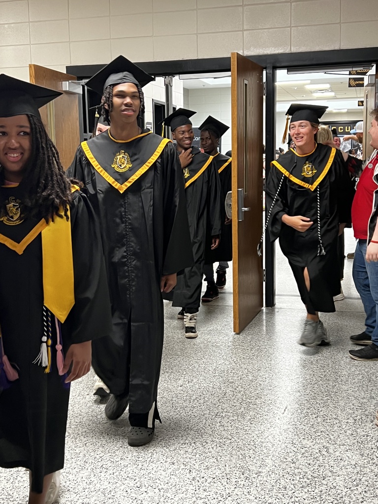 Image showing 🎓 One Last Walk, A Lifetime of Memories: The Class of 2026 Hall Walk 🎓  Today, Friday, May 15, 2026, the hallways of Evans County Schools were filled with a special kind of magic. Our seniors donned their graduation regalia and took their final walk through the schools that helped shape them into the young men and women they are today.  As they marched through the halls, they weren't just walking for themselves—they were walking for the elementary students who gave them high-fives and the middle schoolers who looked up with wide eyes. This tradition serves as a powerful reminder of what hard work and perseverance look like.  Why the Hall Walk matters:  Inspiring the Next Generation: Younger Tigers get to see exactly what their goal is.  A "Thank You" to Teachers: It’s a chance for former teachers to see how much their "little ones" have grown.  The Final Countdown: Tomorrow, these same students will cross Veterans Memorial Field as graduates!  Congratulations to the Class of 2026. You’ve left your mark on these halls, and we can’t wait to see you lead the way tomorrow! 🐯🖤💛  #TheDEN #ClassOf2026 #SeniorHallWalk #TigerLegacy #FullCircle #GraduationEve